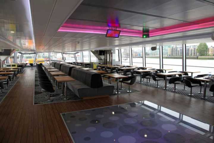 a large room with tables and chairs