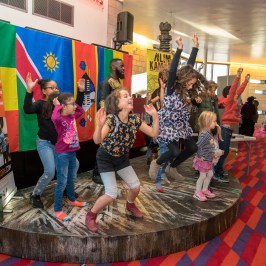 a group of people standing in a room