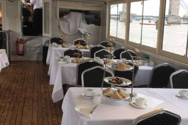 a dining room table in front of a window