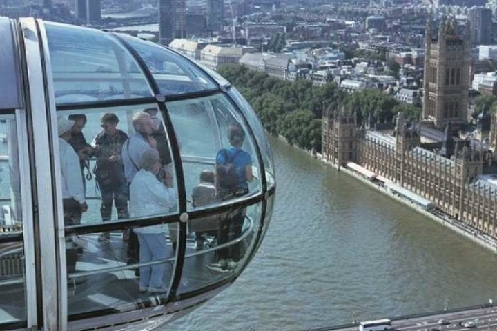 a group of people standing in front of a building
