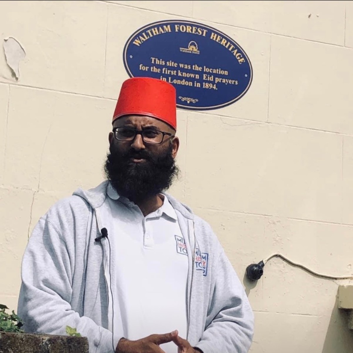 a man holding a sign