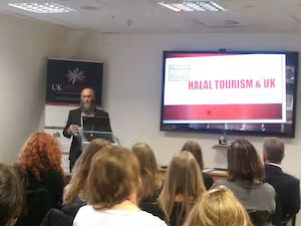 a group of people standing in front of a crowd