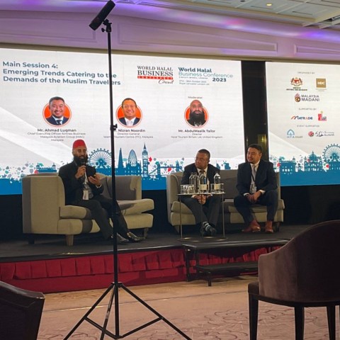 a group of people standing in front of a store