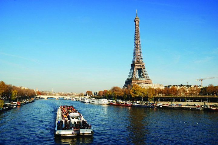 a boat is docked next to a body of water