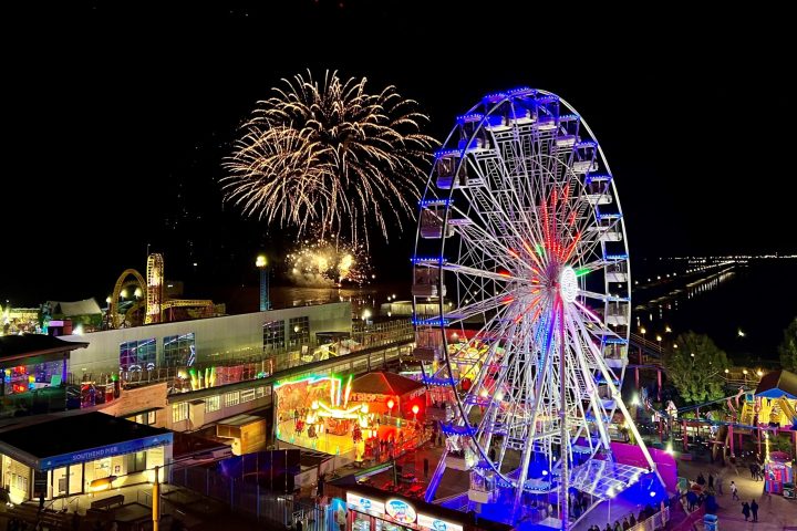 a group of fireworks in the night sky
