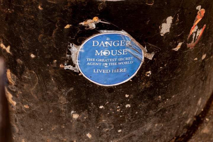 Red and black structure with Danger Mouse plaque.